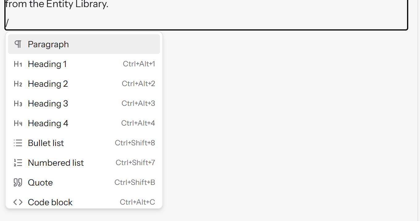 The block menu open under the cursor, listing Paragraph, Heading 1 to 4, Bullet list, Numbered list, Quote and Code block with their keyboard shortcuts